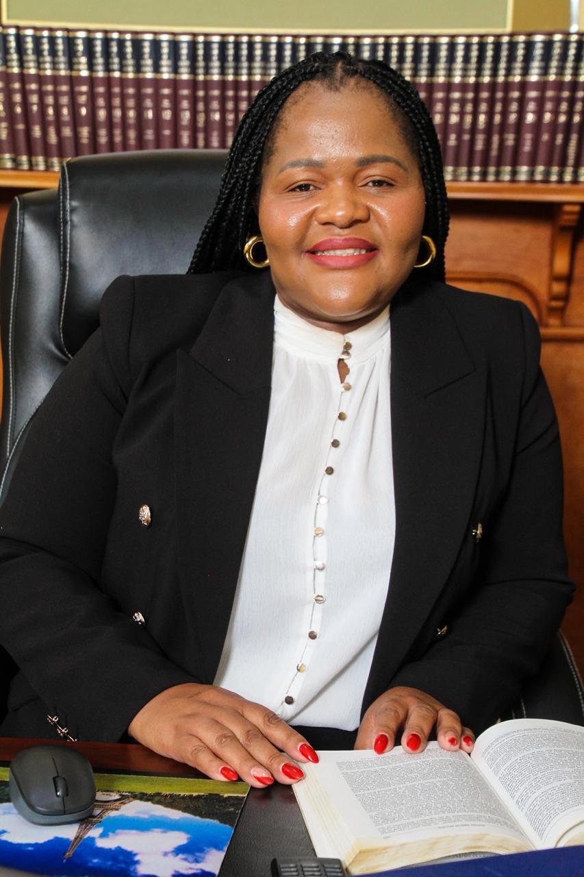 Mrs Nomampinga Ngento at her desk